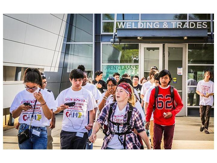 TTLC-  students walking in front of Welding & Trades building in TTLC