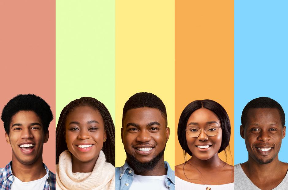 Black students on a rainbow background.