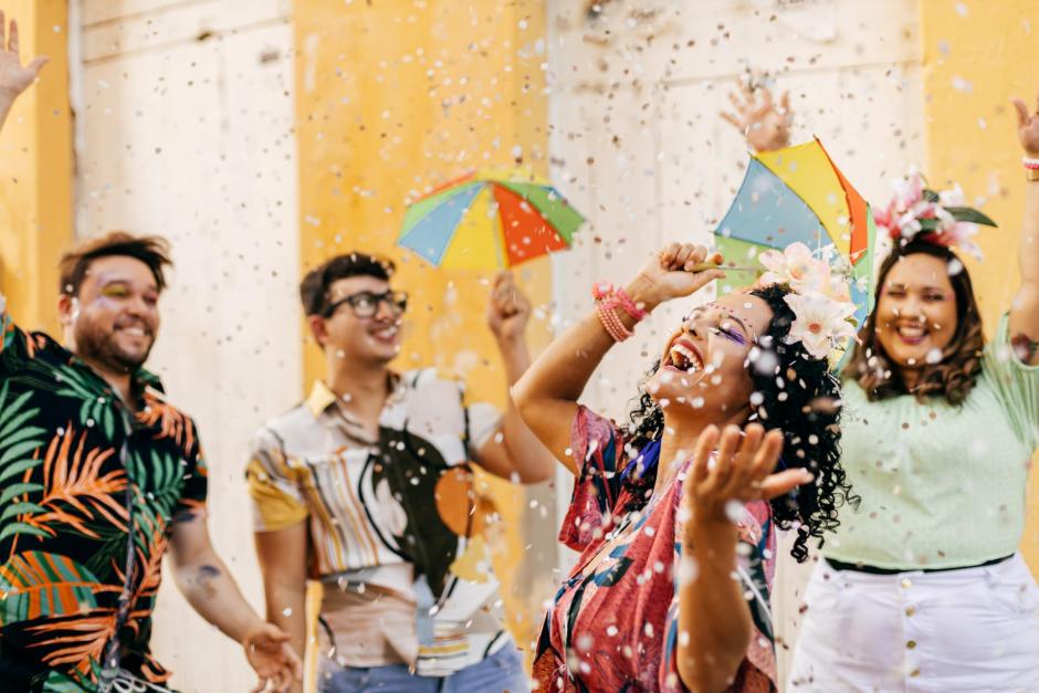 Group of friends celebrating carnival party