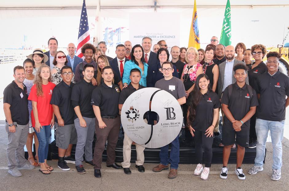 A group shot of city officials and LBCC staff at the Maritime Center event.