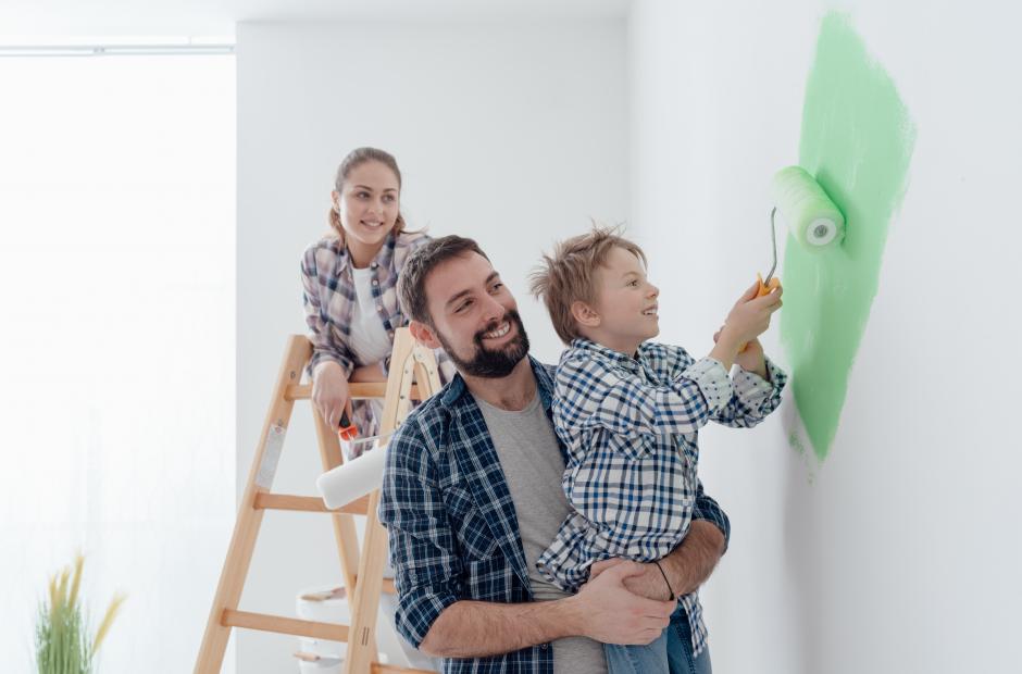 Family painting a room together