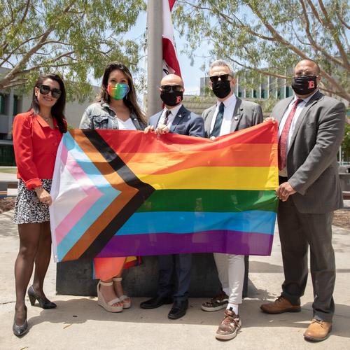 LBCC Board members holding the Pride flag.