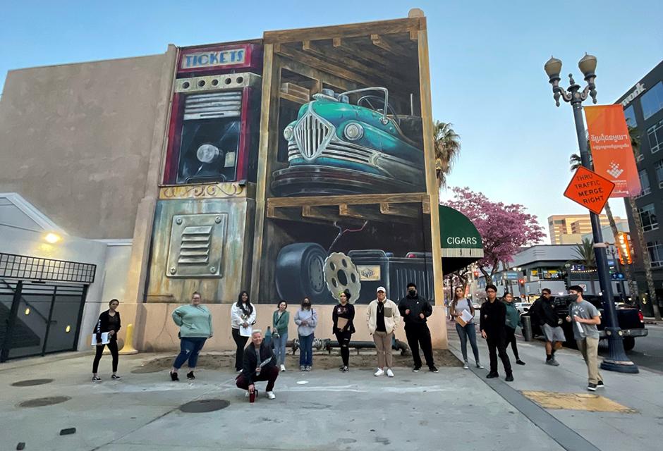 Art History students at Leon Keer’s Dodg’em mural in Long Beach.