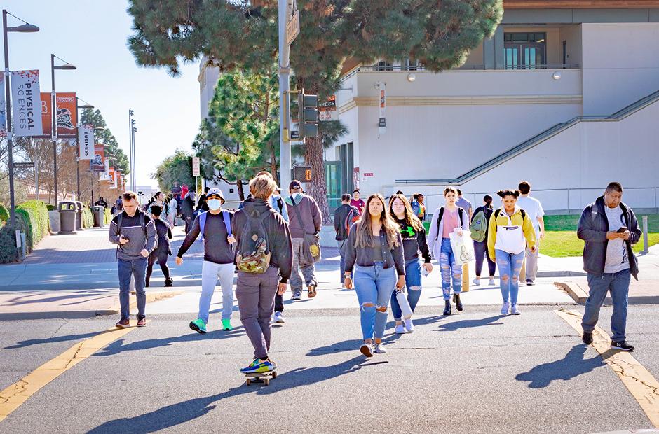 LBCC students crossing the street on campus