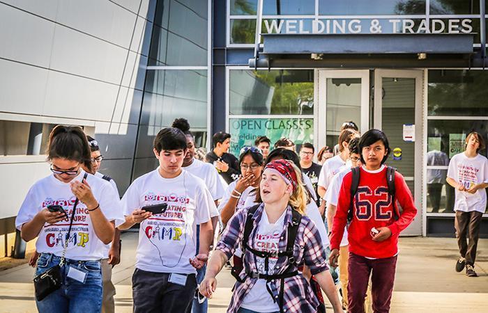 TTLC-  students walking in front of Welding & Trades building in TTLC