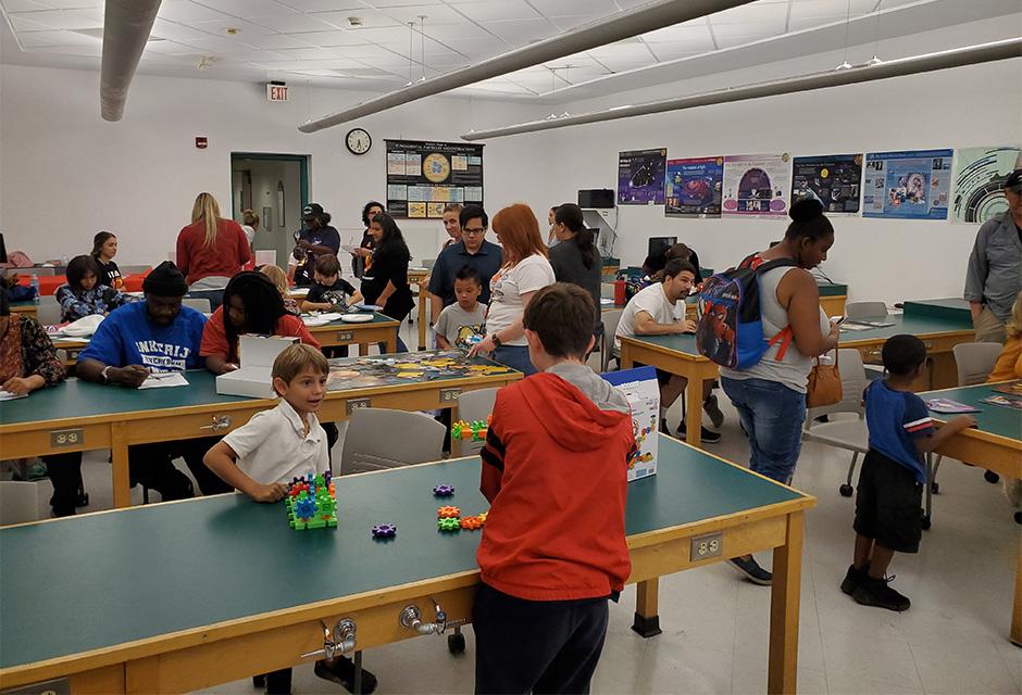 Education students run an interactive earth science themed room at the annual LBCC Science and Engineering Night to gain hands-on experience with lesson design and student engagement.