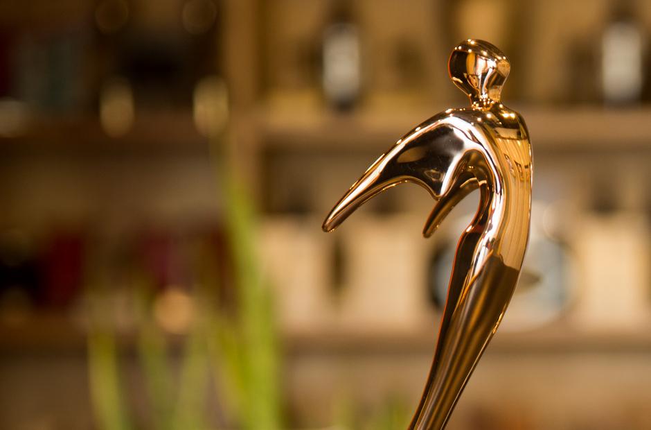 A picture of a golden Telly Award statue.